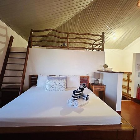 Tongatok Cliff Resort Мамбахао Экстерьер фото
