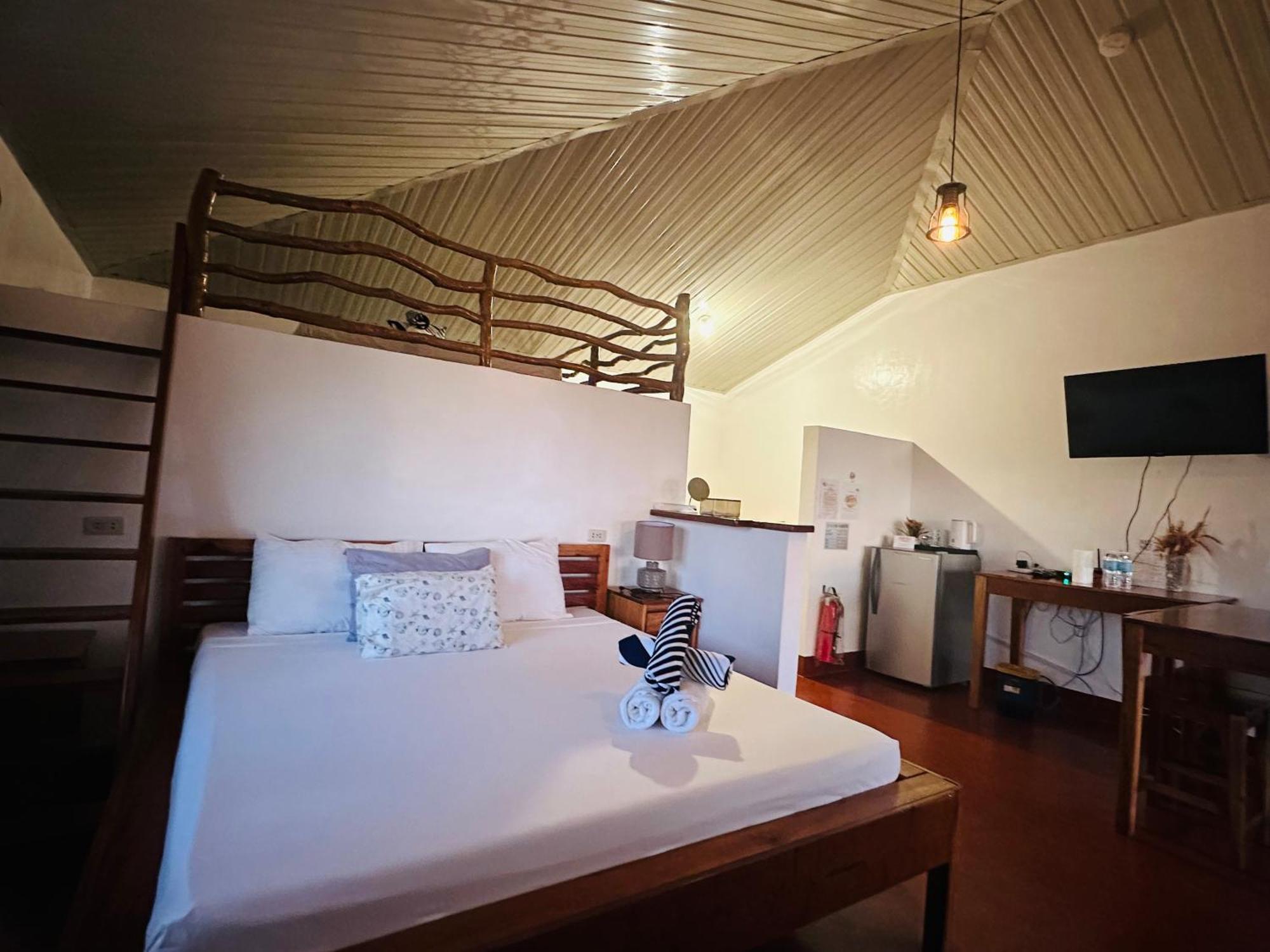 Tongatok Cliff Resort Мамбахао Экстерьер фото
