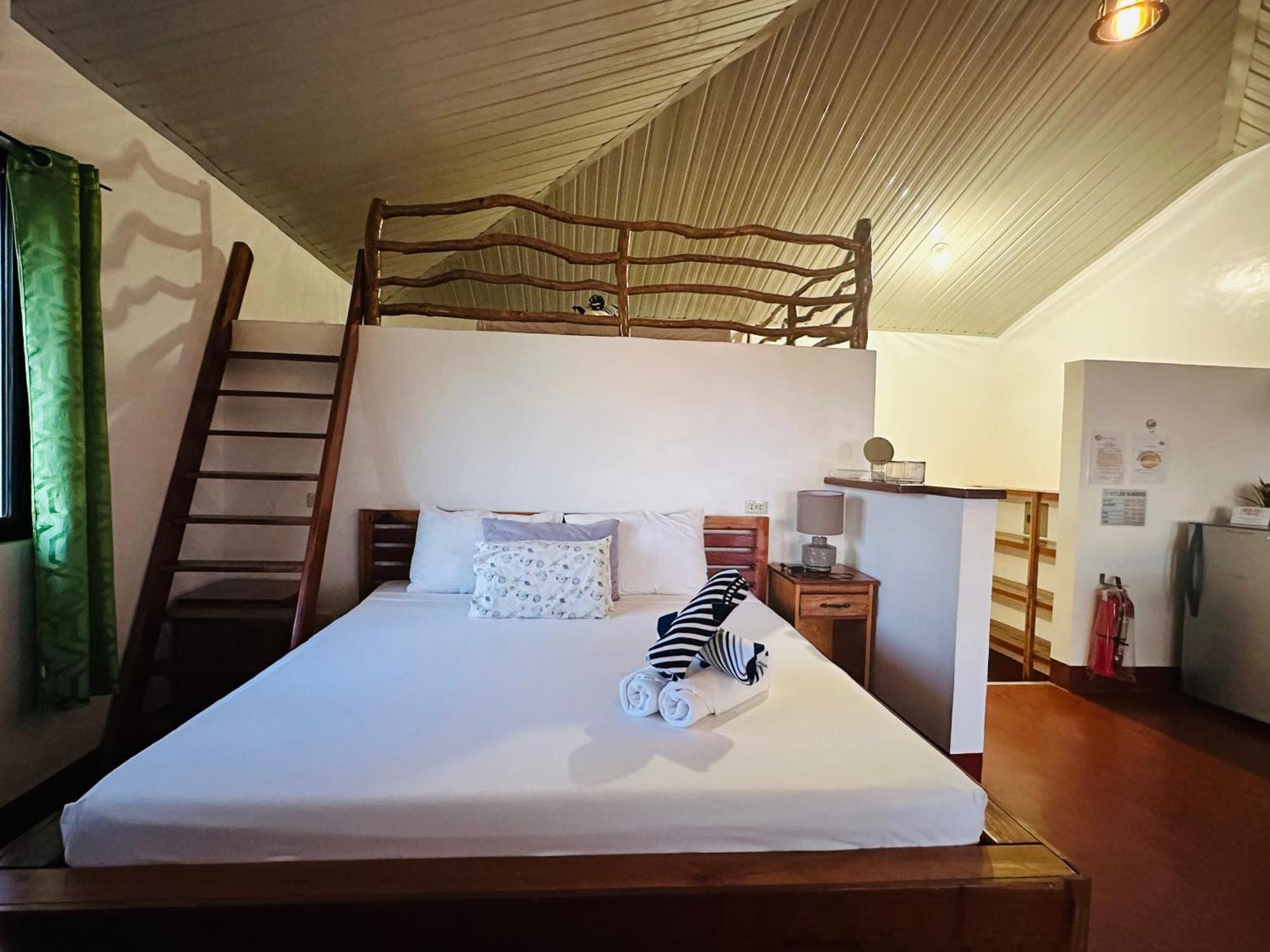 Tongatok Cliff Resort Мамбахао Экстерьер фото